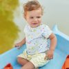 child wearing seagull and beach hut fabric