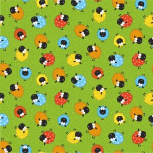 fabric with a green background and multi coloured sheep